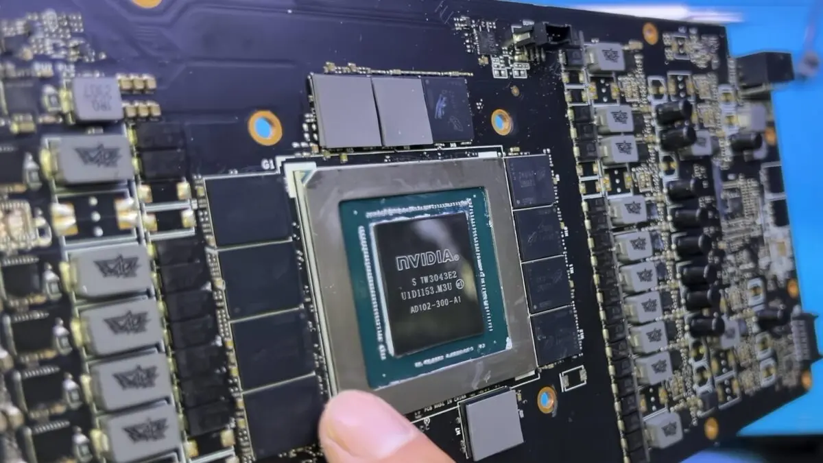 Disassembled ASUS GeForce RTX 4090 graphics card showing internal components