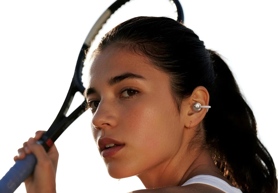 Dangbi Air 1S clip-on earbuds with a large touchscreen charging case