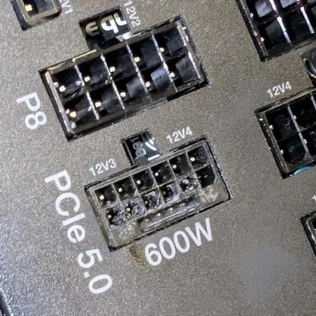 Damaged RTX 5090 graphics card and power supply unit