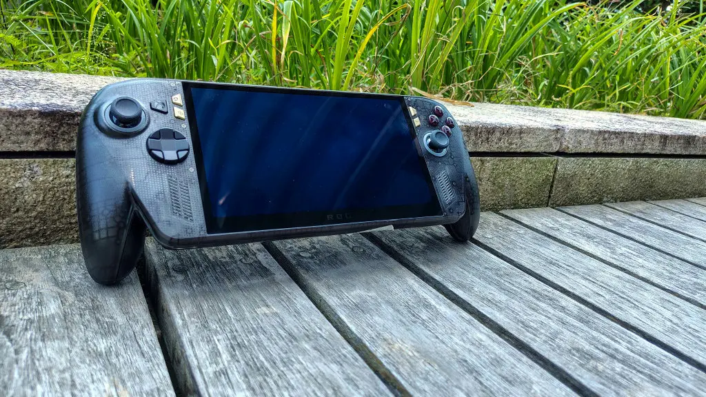 ASUS ROG Xbox Ally X20 handheld gaming PC with translucent shell and gold buttons