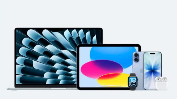 Apple iPhone and Mac devices on a desk