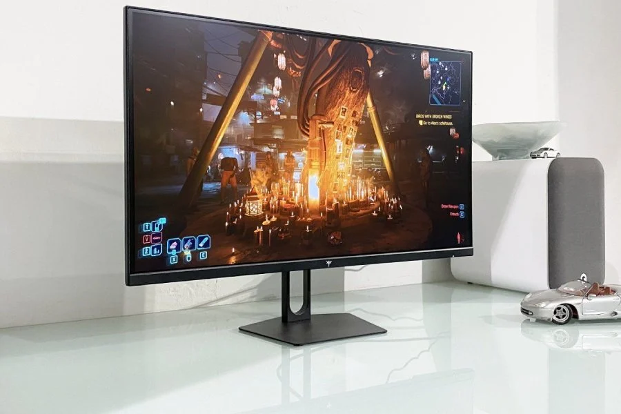 Collage of budget gaming monitors from Dell, Alienware, and Redmi