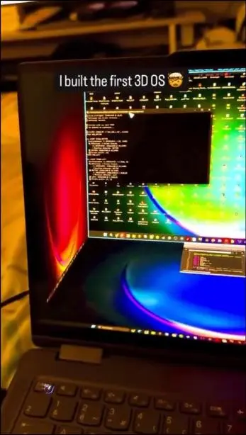 Screenshot of the custom 3D OS interface showing a cube-shaped desktop on a laptop screen