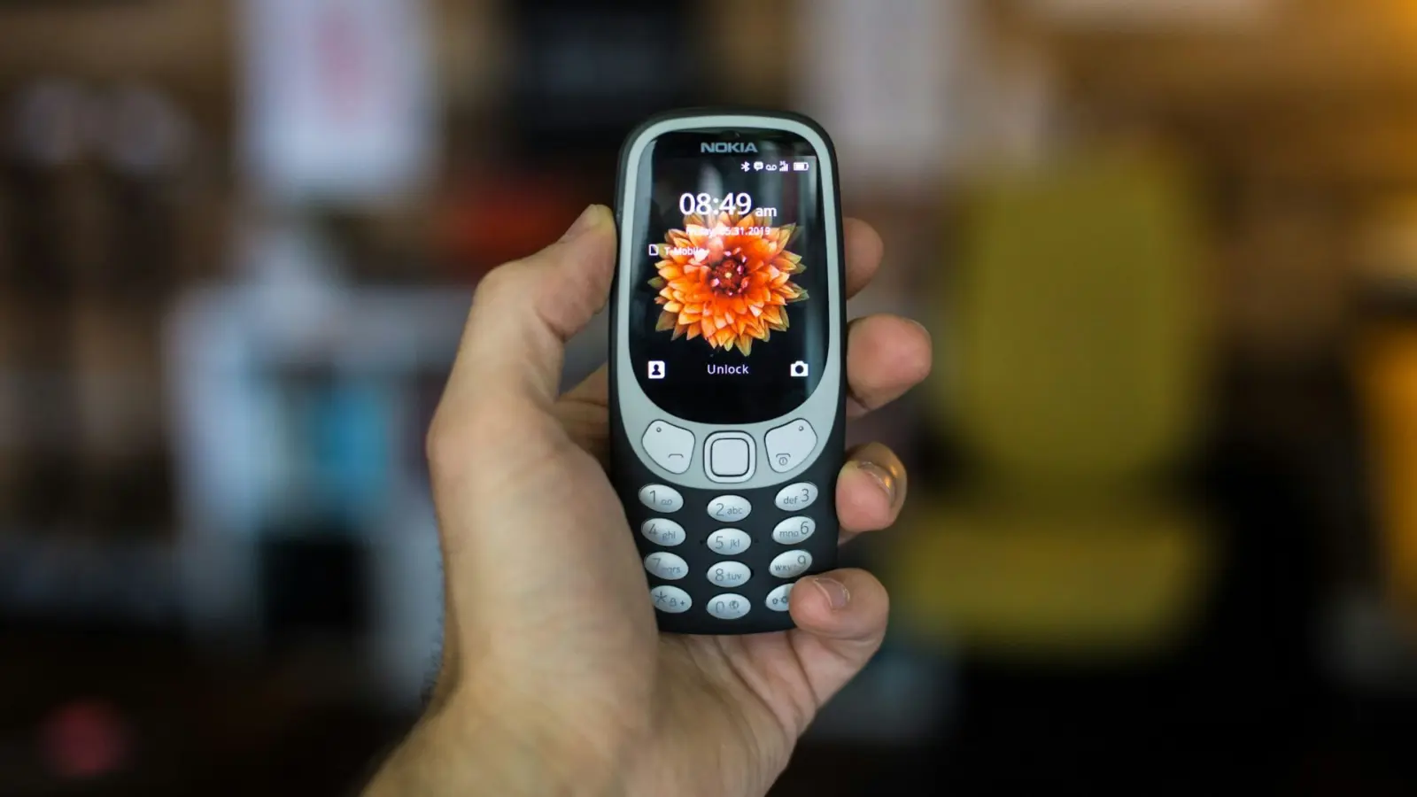 Overview of five 4G feature phones on a table