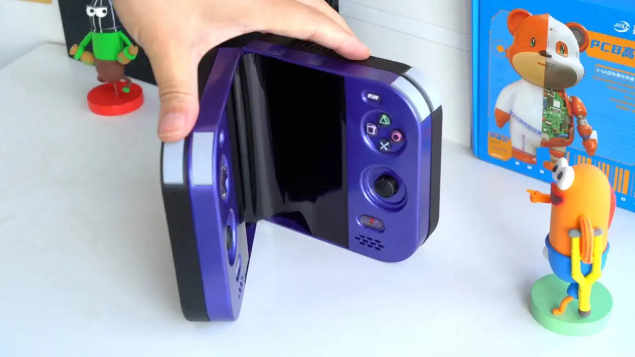DIY enthusiast builds folding portable PlayStation 2 from three broken consoles