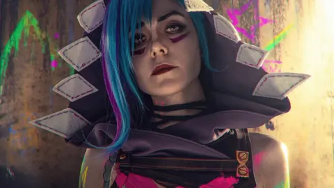 Jinx Cosplay by Evgeniya Pashkova Captures Arcane Character’s Neon-Blue Tattoos and Blue Hair