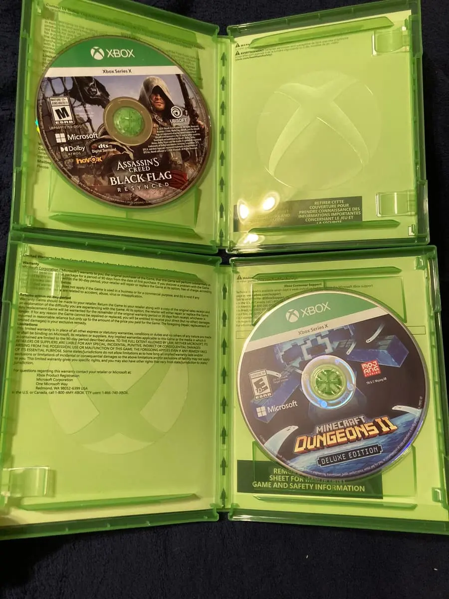 Close-up of a physical video game case with visible packaging damage